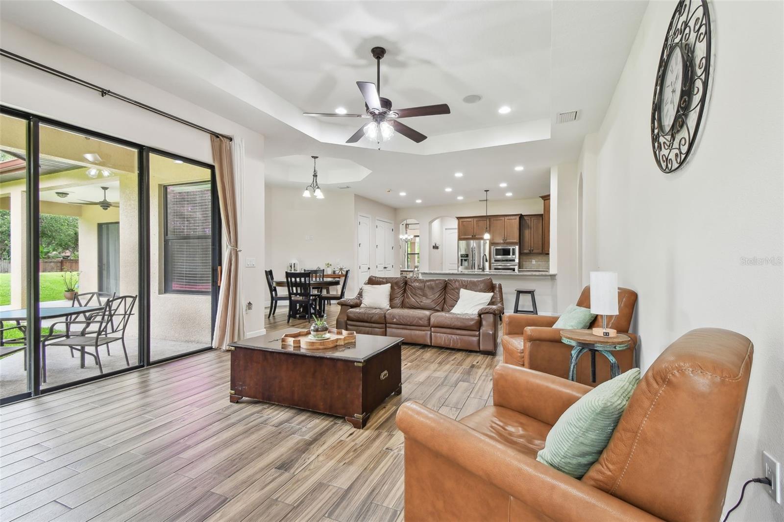LIVING ROOM WITH TRAY CEILINGS