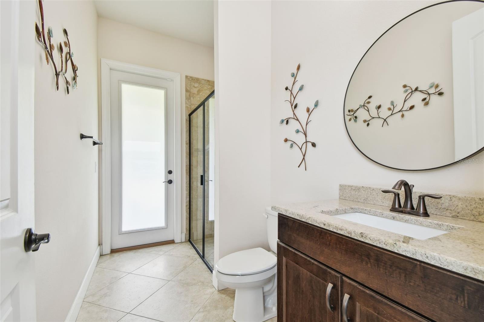 BATHROOM 3/POOL BATH/BACKYARD ENTRANCE