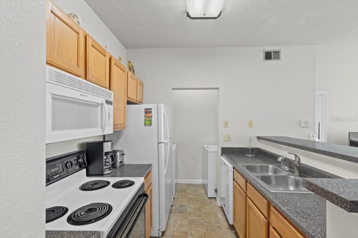 Beautiful kitchen open to living/dining room.