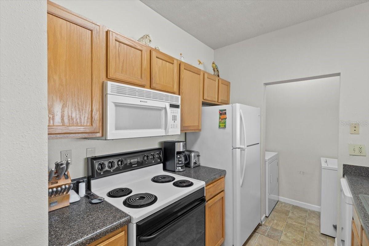 Kitchen opens to laundry room.