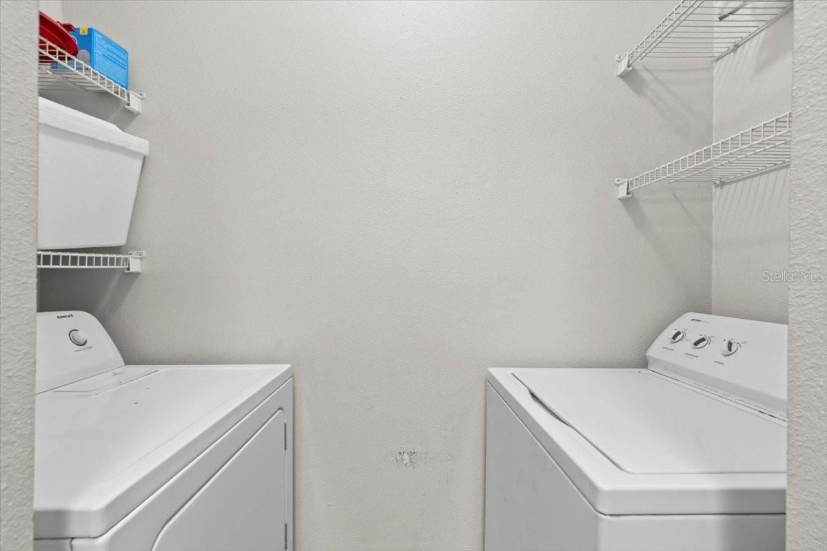 Laundry room w/full size washer & dryer