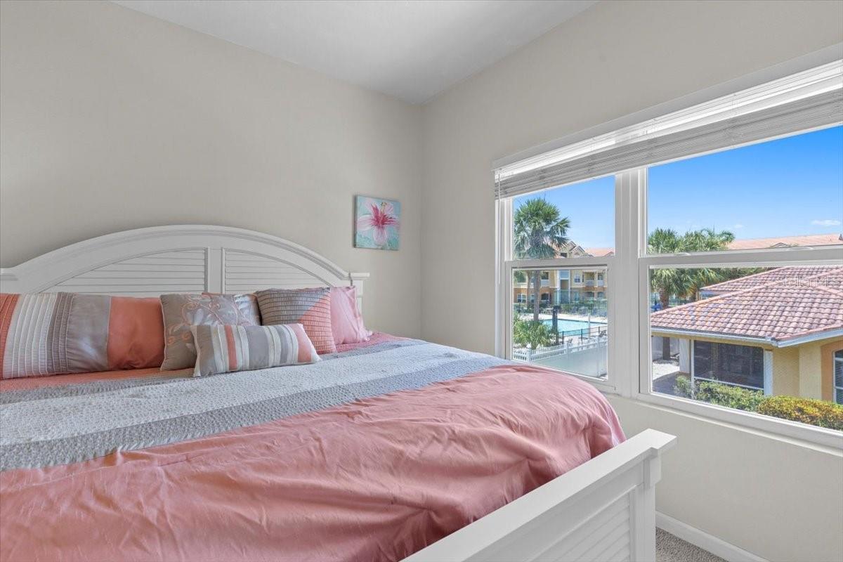 Master bedroom with pool views!