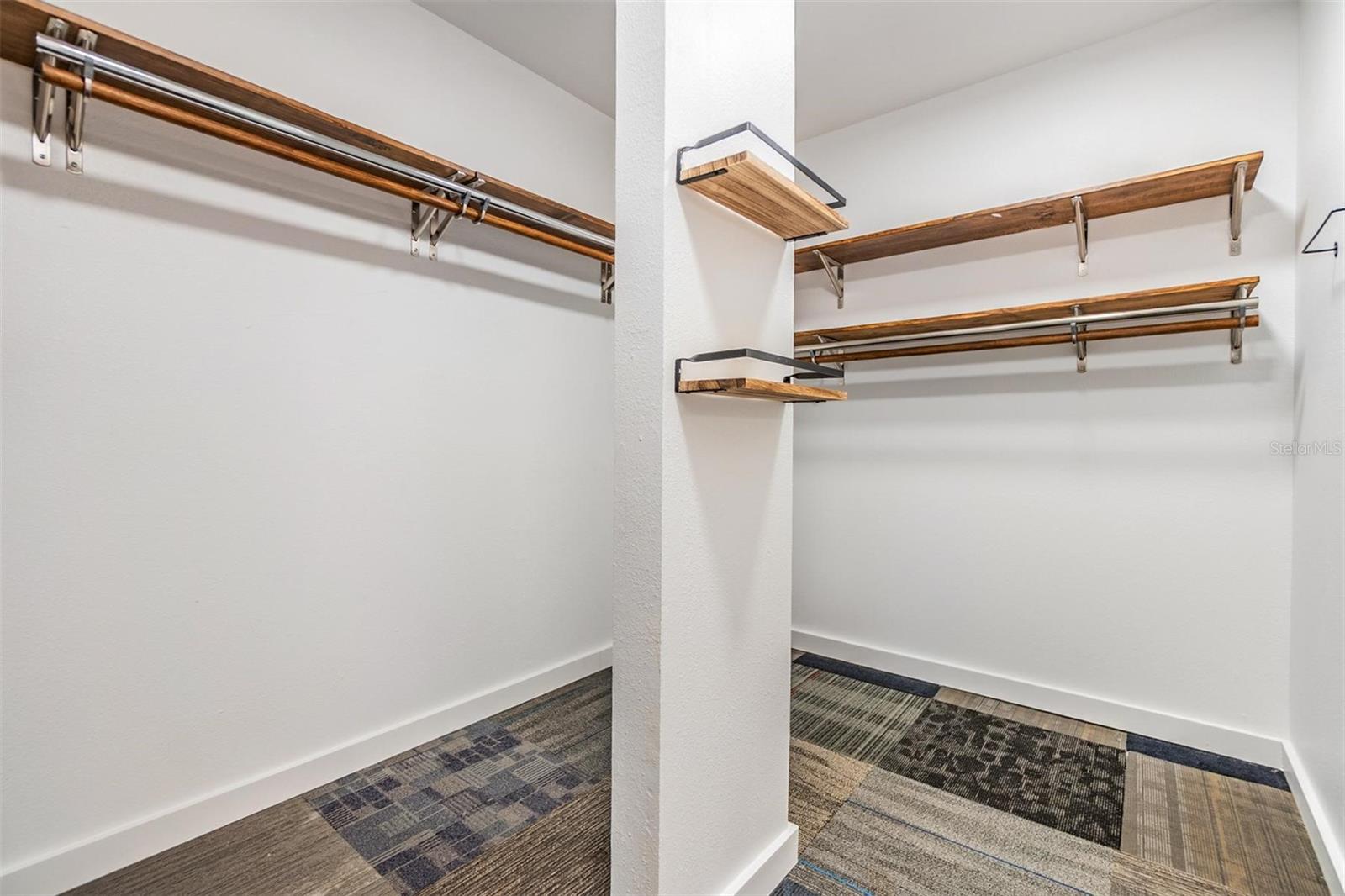 Primary bedroom walk-in closet.