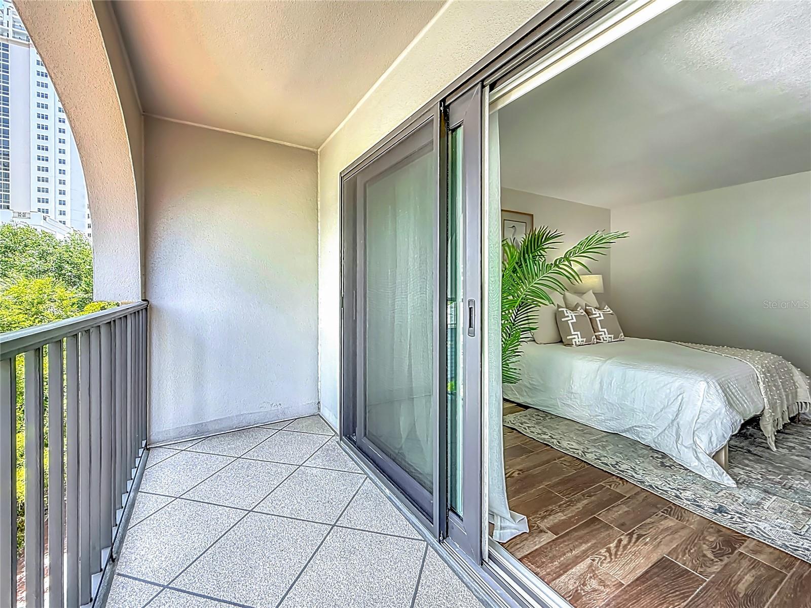 The sliding glass doors on both balconies have been replaced with hurricane impact, double paned argon glass filled glass doors with built-in UV protection.
