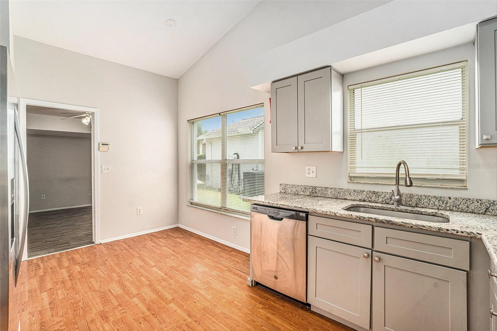 Eat in Kitchen - entry to partitioned garage