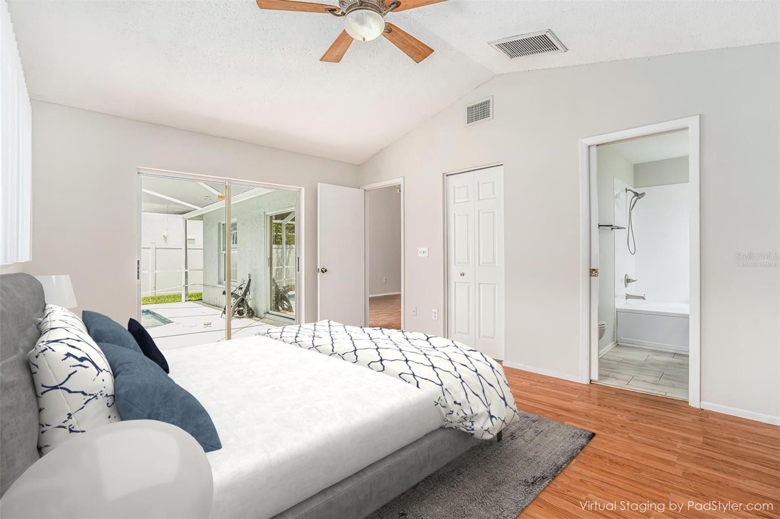 Virtually Staged - Primary Bedroom Suite- access to pool