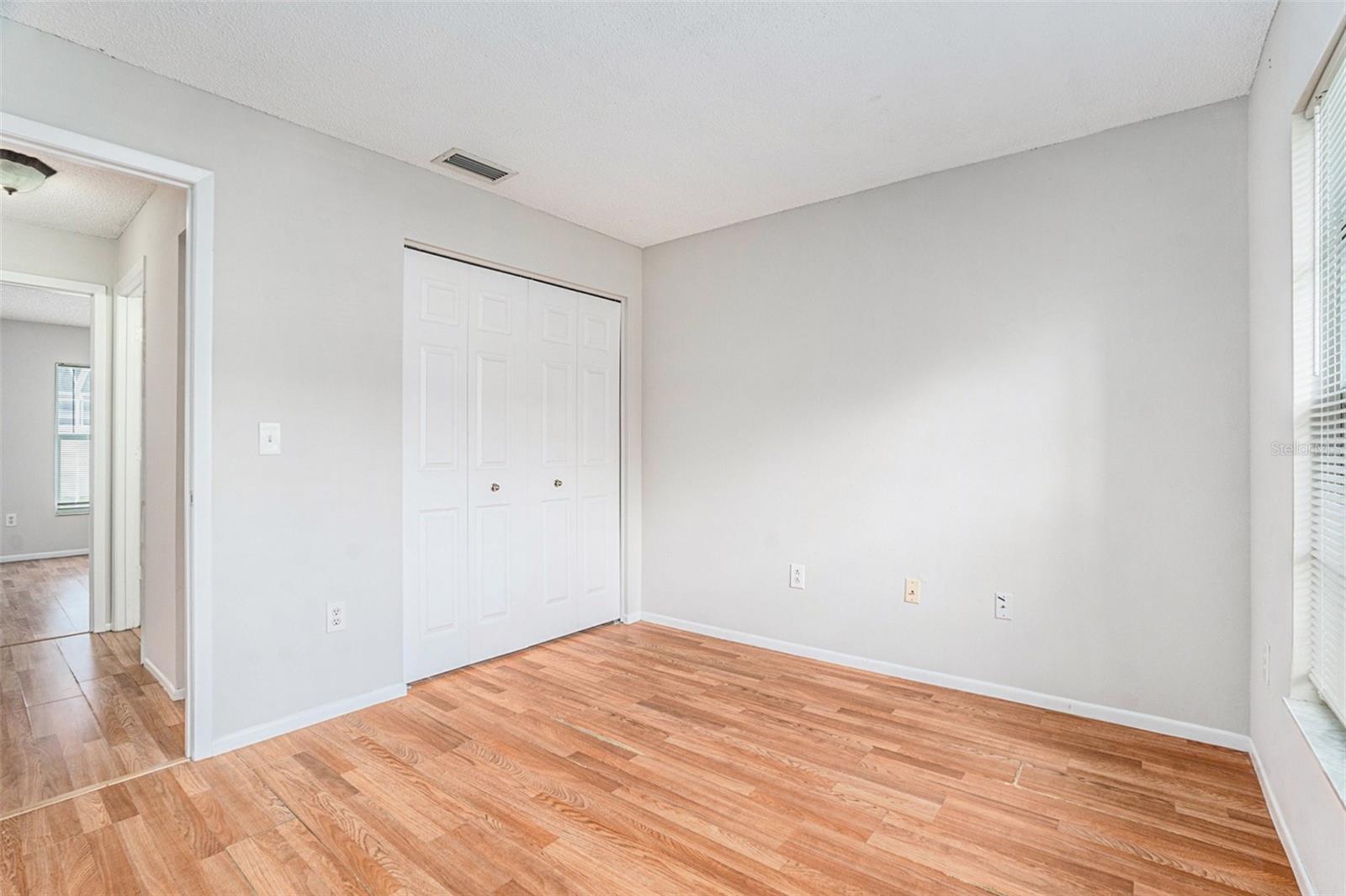 Bedroom with built in closet