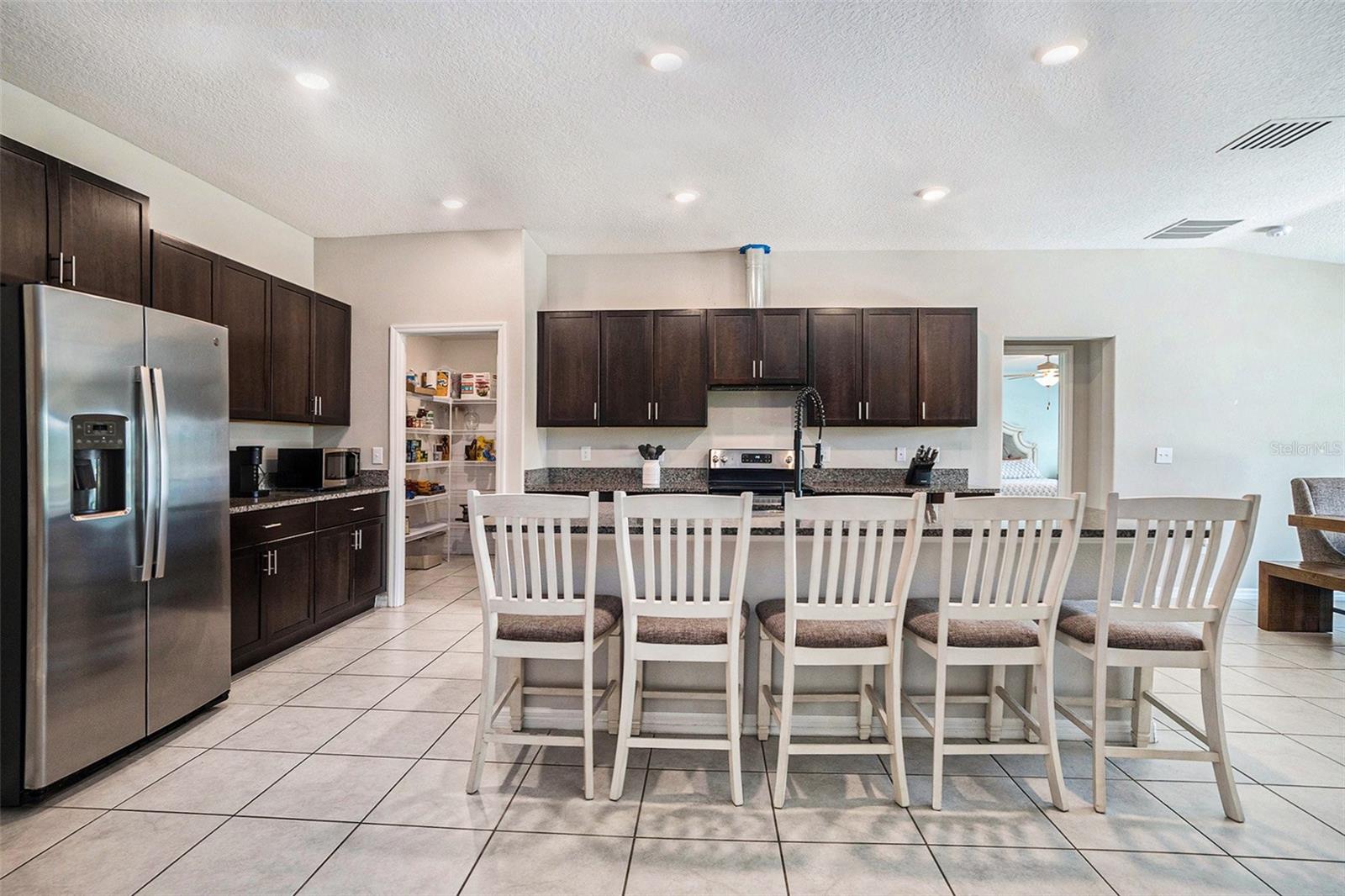 A chef's dream! Large kitchen island and plenty of storage space