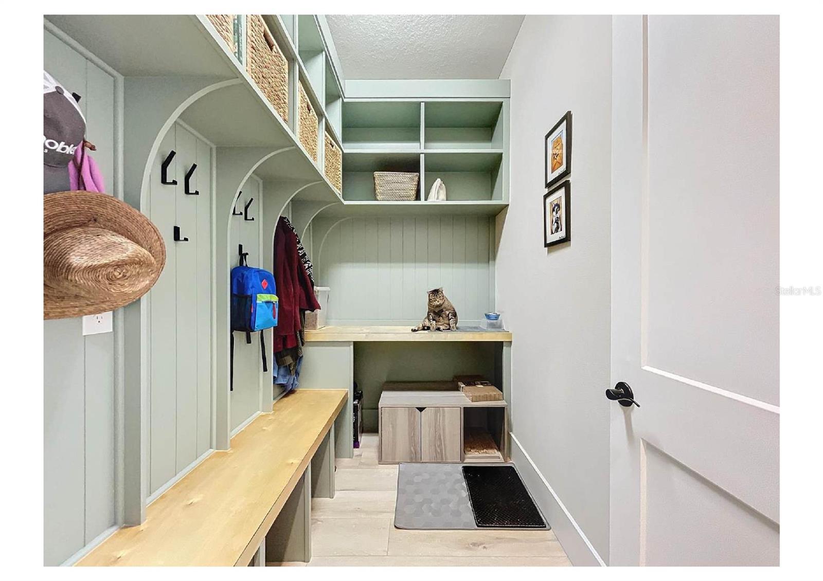 Custom built mudroom coming in from the Garage to help keep you organized as you enter or leave your home.