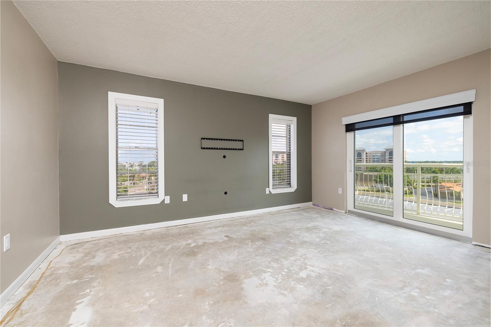 Primary Bedroom with Balcony view