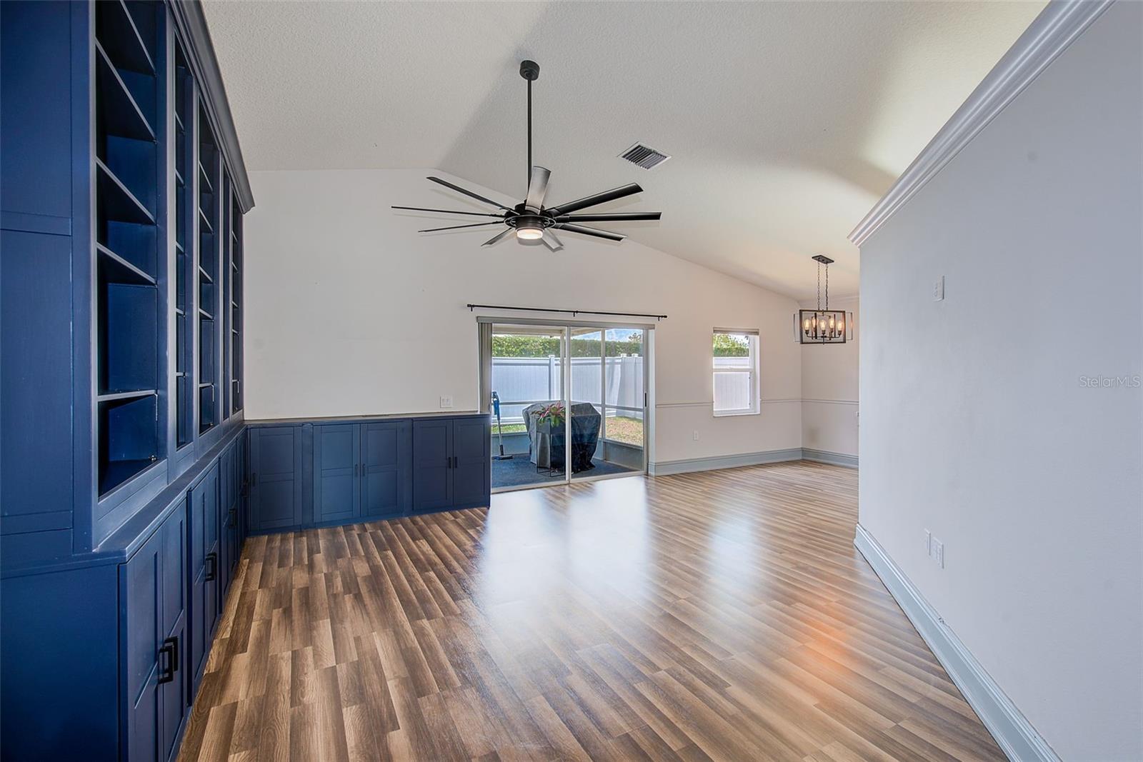 GREAT ROOM WITH SLIDERS TO LANAI AND ACCESS TO DINING ROOM
