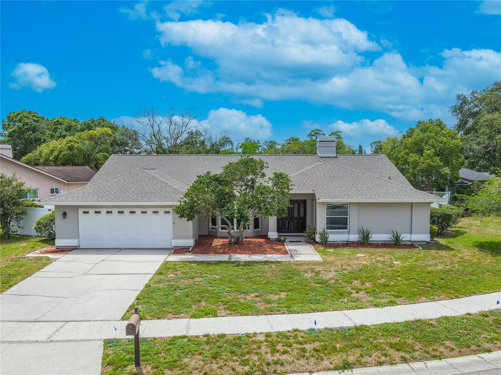 This beautifully maintained 3-bedroom, 2-bath pool home has undeniable curb appeal and a fresh, modern exterior. Conveniently located  in Woodland Estates in East Lake Woodlands, a quiet, established neighborhood.