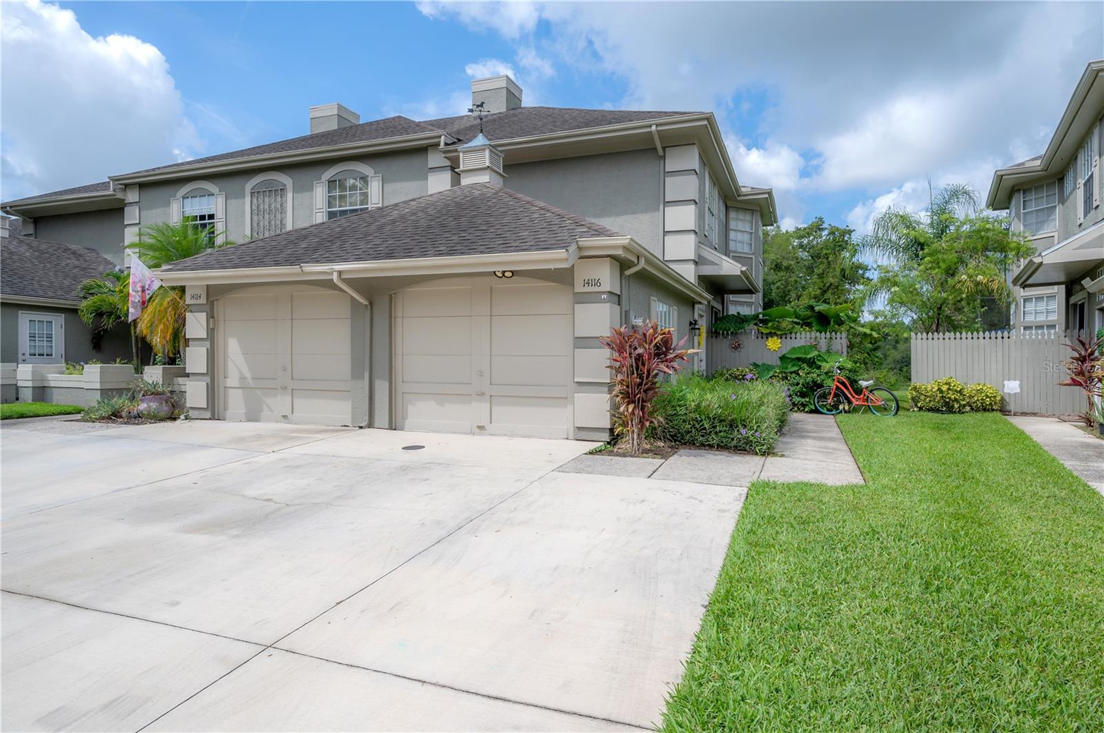 Oversized parking pad and attached garage give ample parking