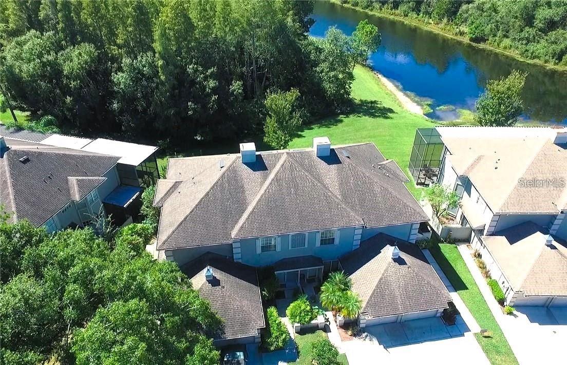 Tucked back against a conservation space and pond