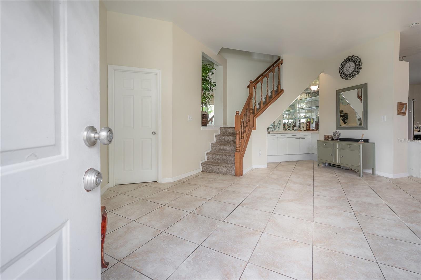 Living and dining area with built-in bar