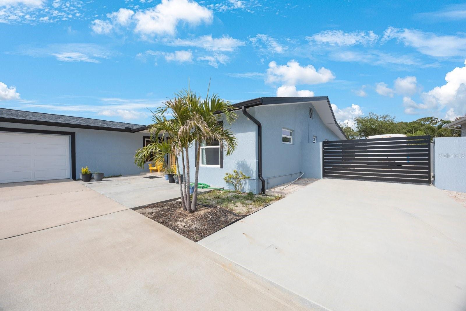 Bring your toys! This property offers generous side-yard space to accommodate a trailer, boat, or RV.