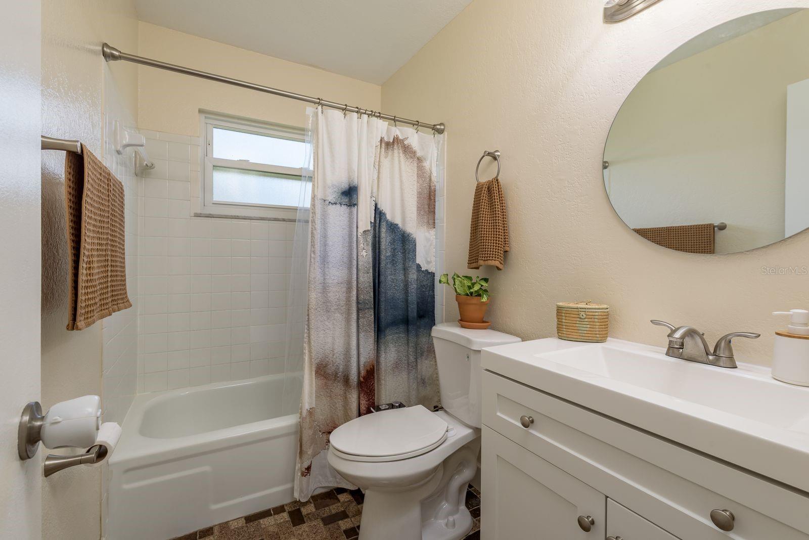 Hallway Bathroom with new vanity and mirror 2025