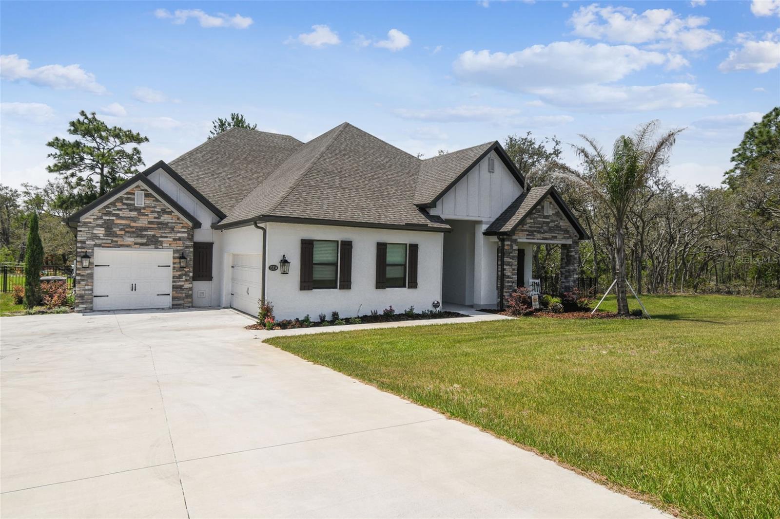 Split 2-car, 1-car garage with extra long/wide driveway