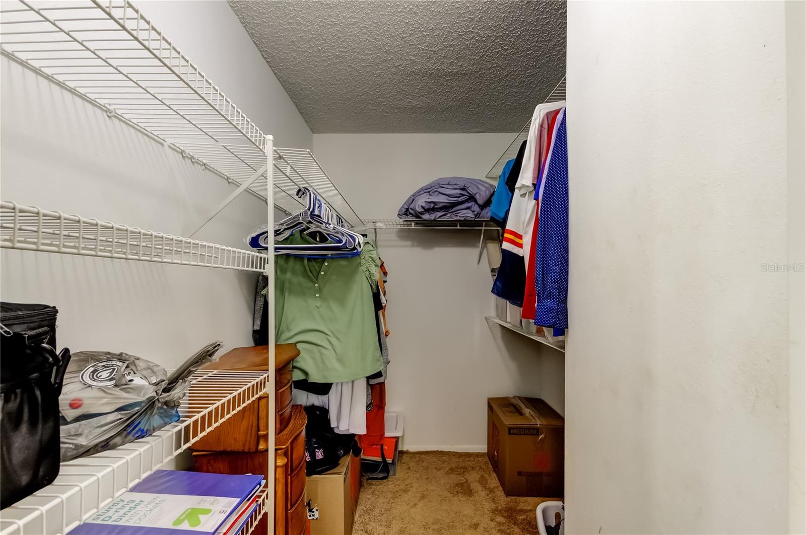 Spacious walk in closet in primary BR
