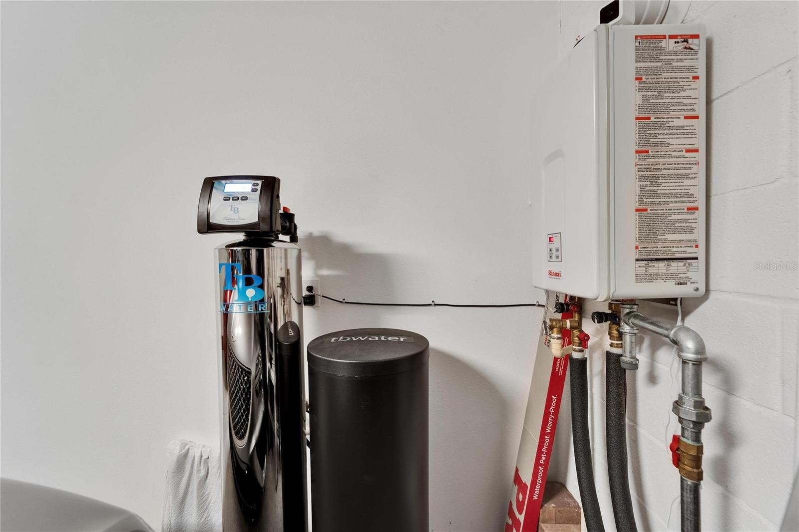 Water softener in garage that conveys