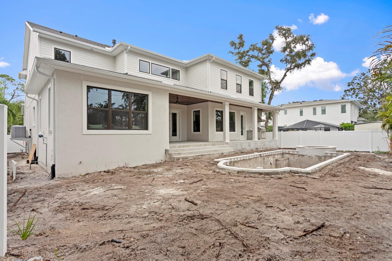 yard and pool under construction