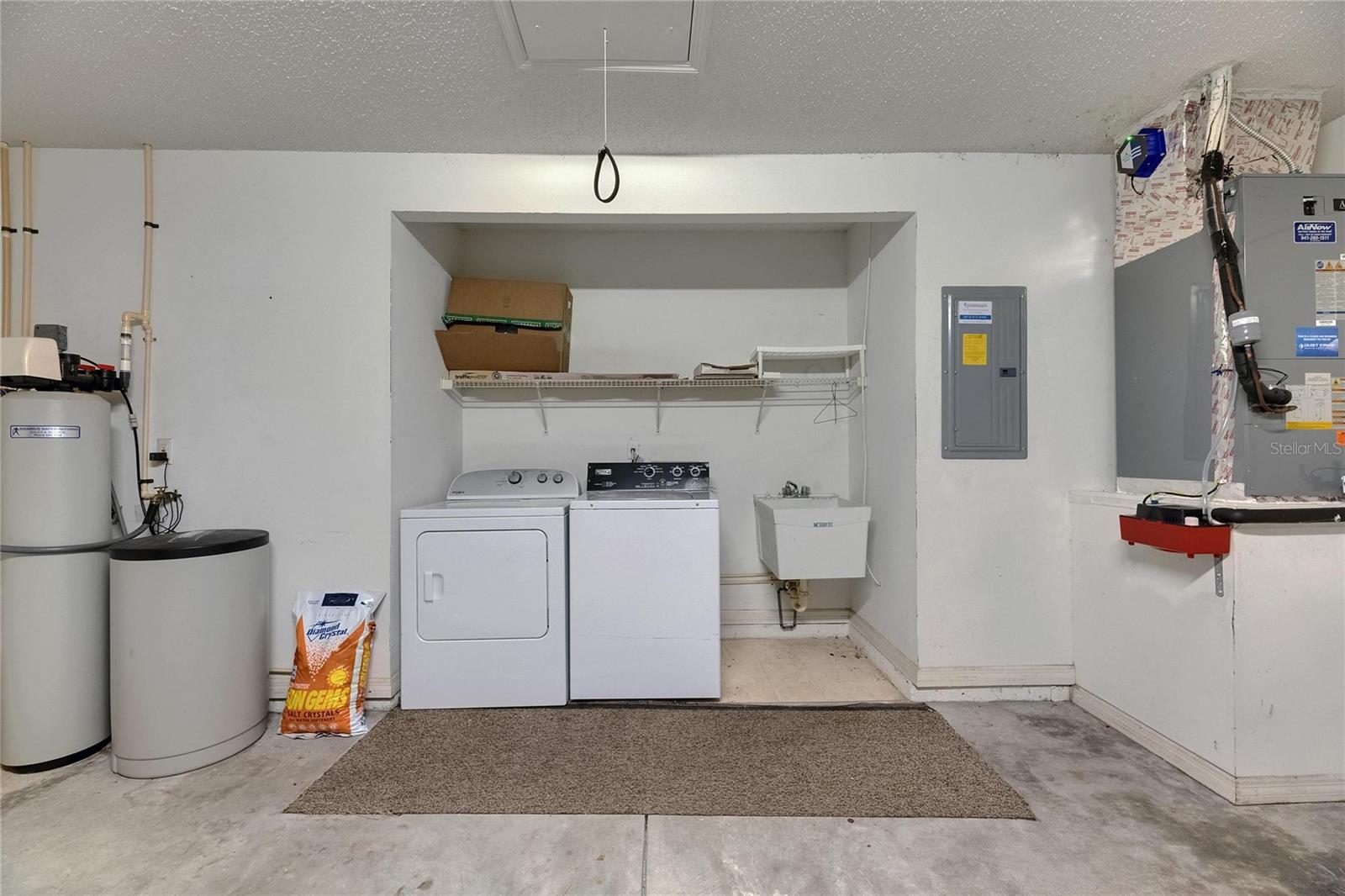 The washer & dryer are conveniently located to save living space, with a mudsink. The A/C has a UV light, all plumbing & electric has been updated