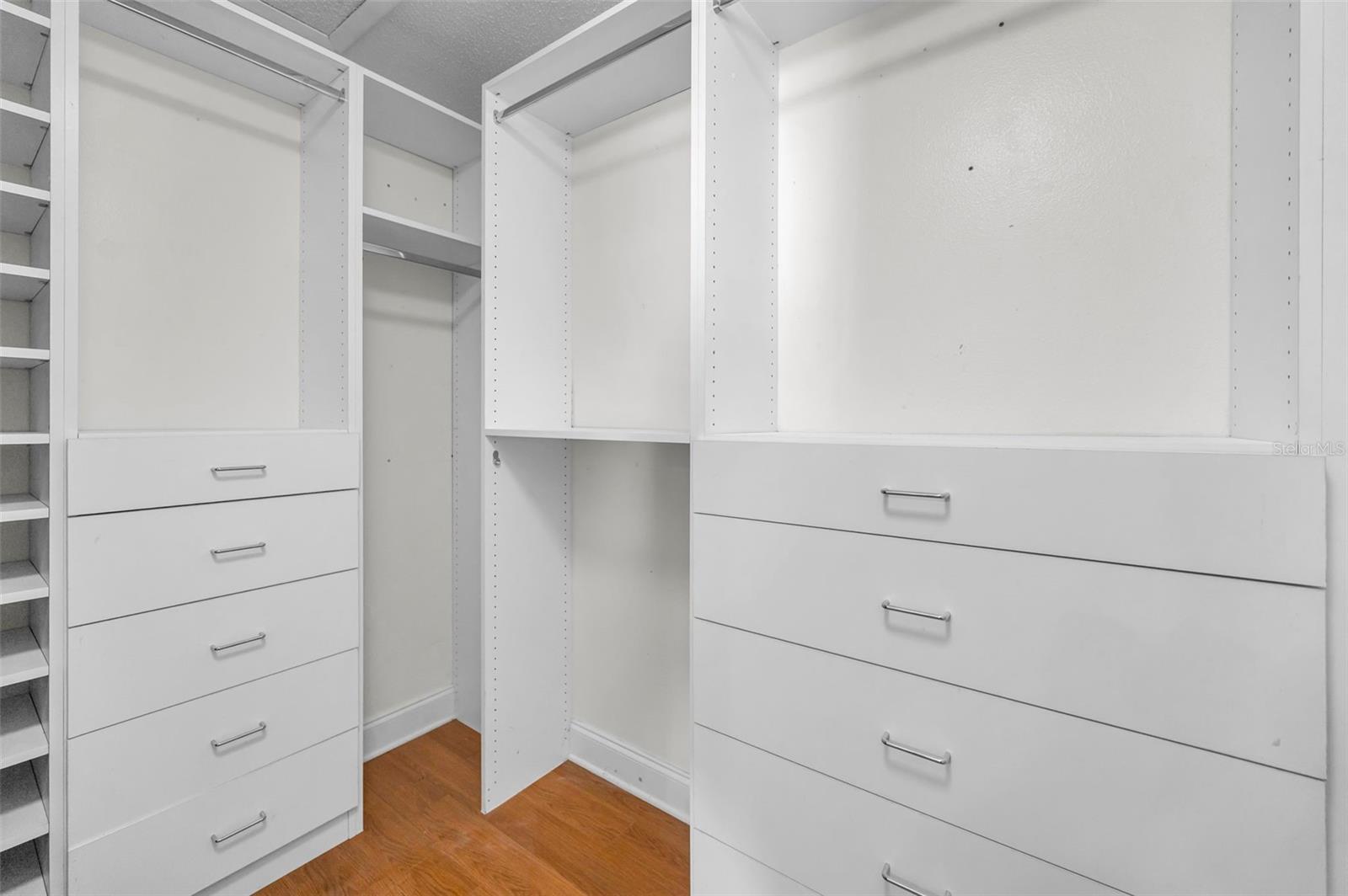 Primary Bedroom Walk-In Closet w/ Custom Shelving