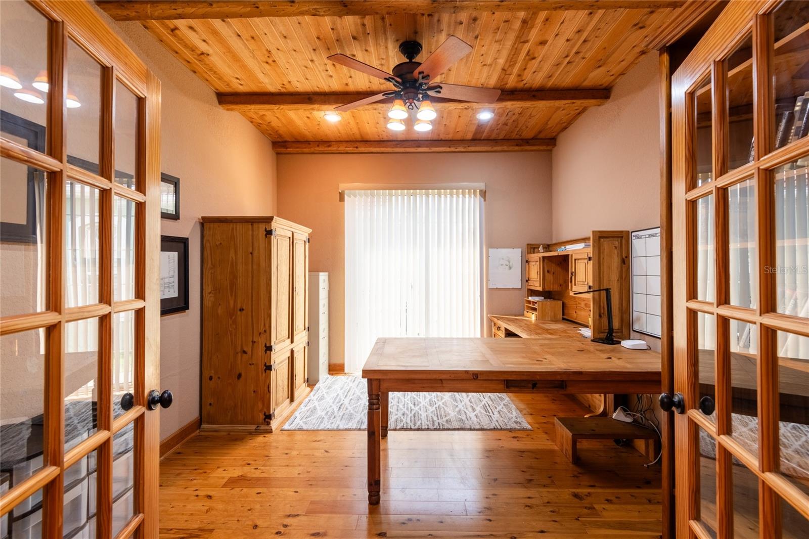 Office complete with desk.  Sliding glass doors lead to side yard.