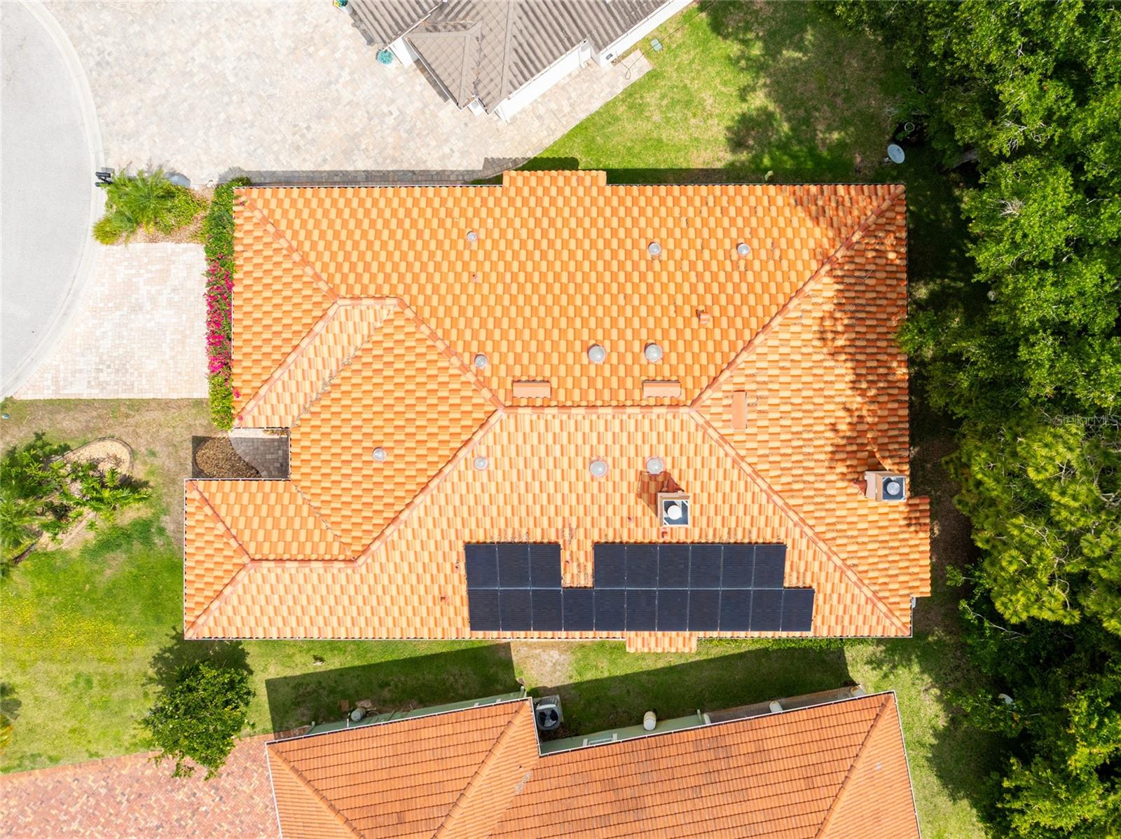 Tile roof showing solar panels