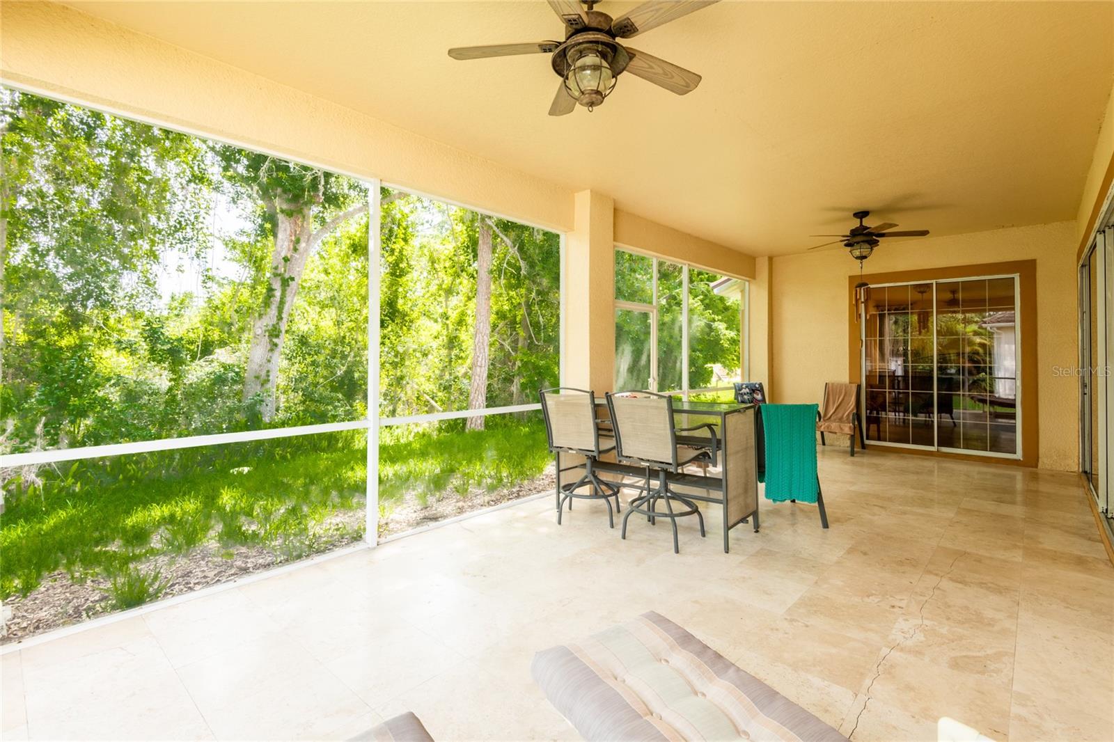 Huge tiled and screen lanai.