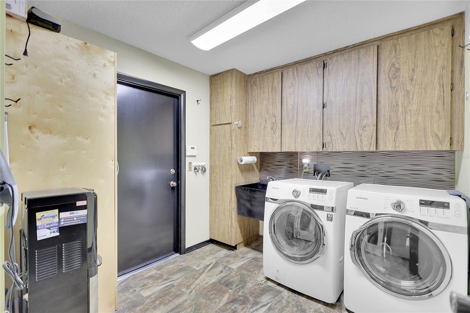 Laundry room with storage