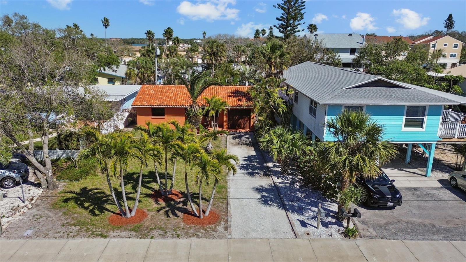 Welcome to 819 Gulf Blvd, a charming 2-bedroom, 1-bath ranch-style quaint Bungalow located just steps from beach access on the stunning shores of Indian Rocks Beach, Indian Rocks Beach Nature Preserve with public dog park and a Boardwalk to through the Mangroves on the Intercoastal.