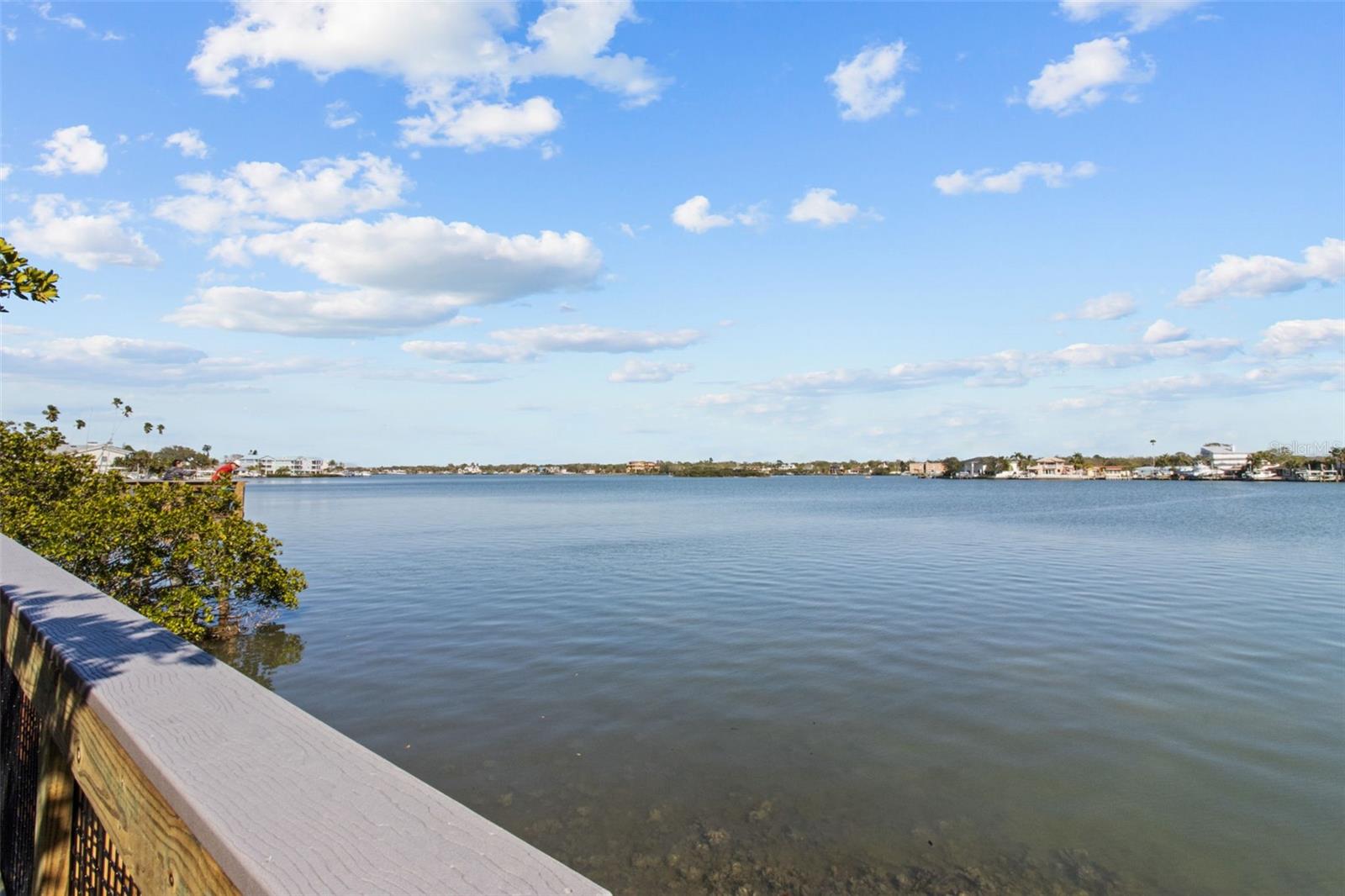 Welcome to 819 Gulf Blvd, a charming 2-bedroom, 1-bath ranch-style quaint Bungalow located just steps from beach access on the stunning shores of Indian Rocks Beach, Indian Rocks Beach Nature Preserve with public dog park and a Boardwalk to through the Mangroves on the Intercoastal.