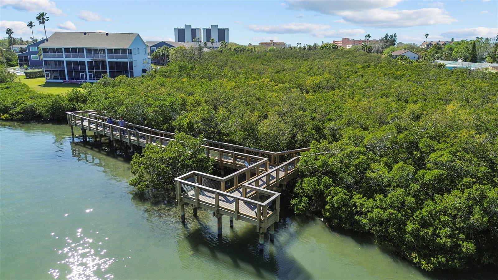 Welcome to 819 Gulf Blvd, a charming 2-bedroom, 1-bath ranch-style quaint Bungalow located just steps from beach access on the stunning shores of Indian Rocks Beach, Indian Rocks Beach Nature Preserve with public dog park and a Boardwalk to through the Mangroves on the Intercoastal.