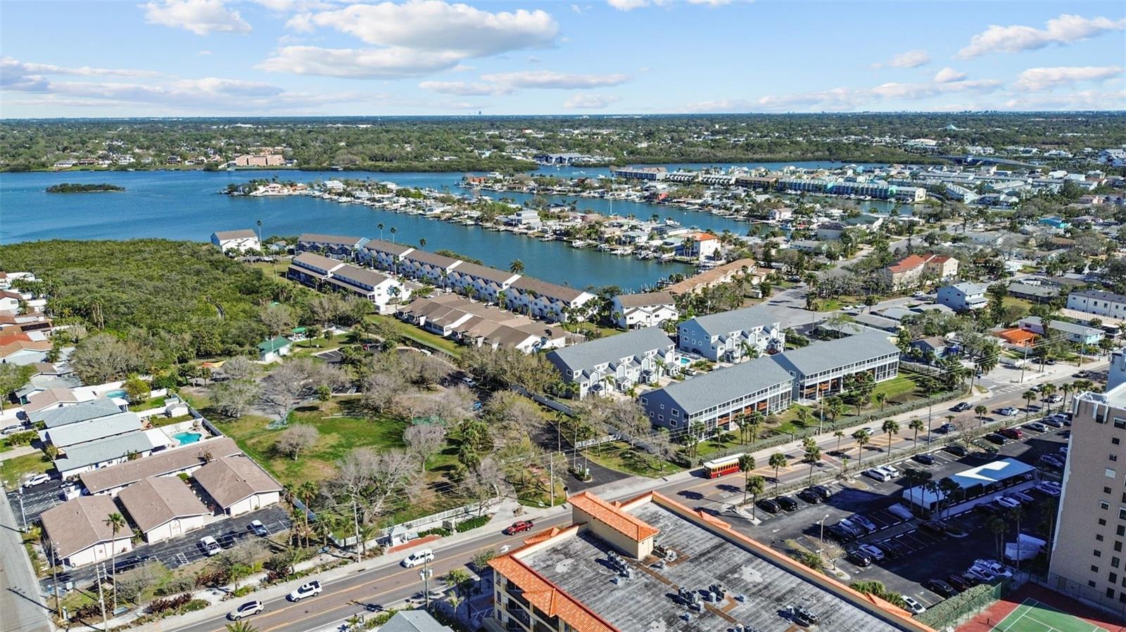 Welcome to 819 Gulf Blvd, a charming 2-bedroom, 1-bath ranch-style quaint Bungalow located just steps from beach access on the stunning shores of Indian Rocks Beach, Indian Rocks Beach Nature Preserve with public dog park and a Boardwalk to through the Mangroves on the Intercoastal.