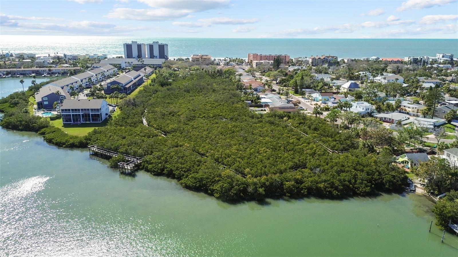 Welcome to 819 Gulf Blvd, a charming 2-bedroom, 1-bath ranch-style quaint Bungalow located just steps from beach access on the stunning shores of Indian Rocks Beach, Indian Rocks Beach Nature Preserve with public dog park and a Boardwalk to through the Mangroves on the Intercoastal.