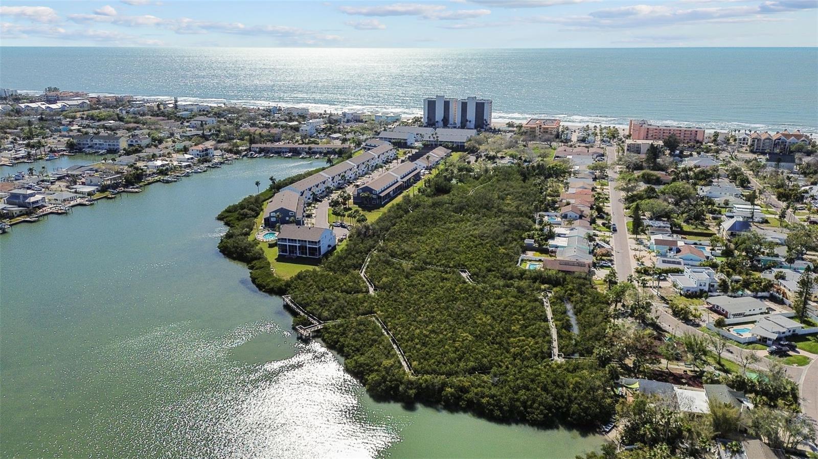 Welcome to 819 Gulf Blvd, a charming 2-bedroom, 1-bath ranch-style quaint Bungalow located just steps from beach access on the stunning shores of Indian Rocks Beach, Indian Rocks Beach Nature Preserve with public dog park and a Boardwalk to through the Mangroves on the Intercoastal.