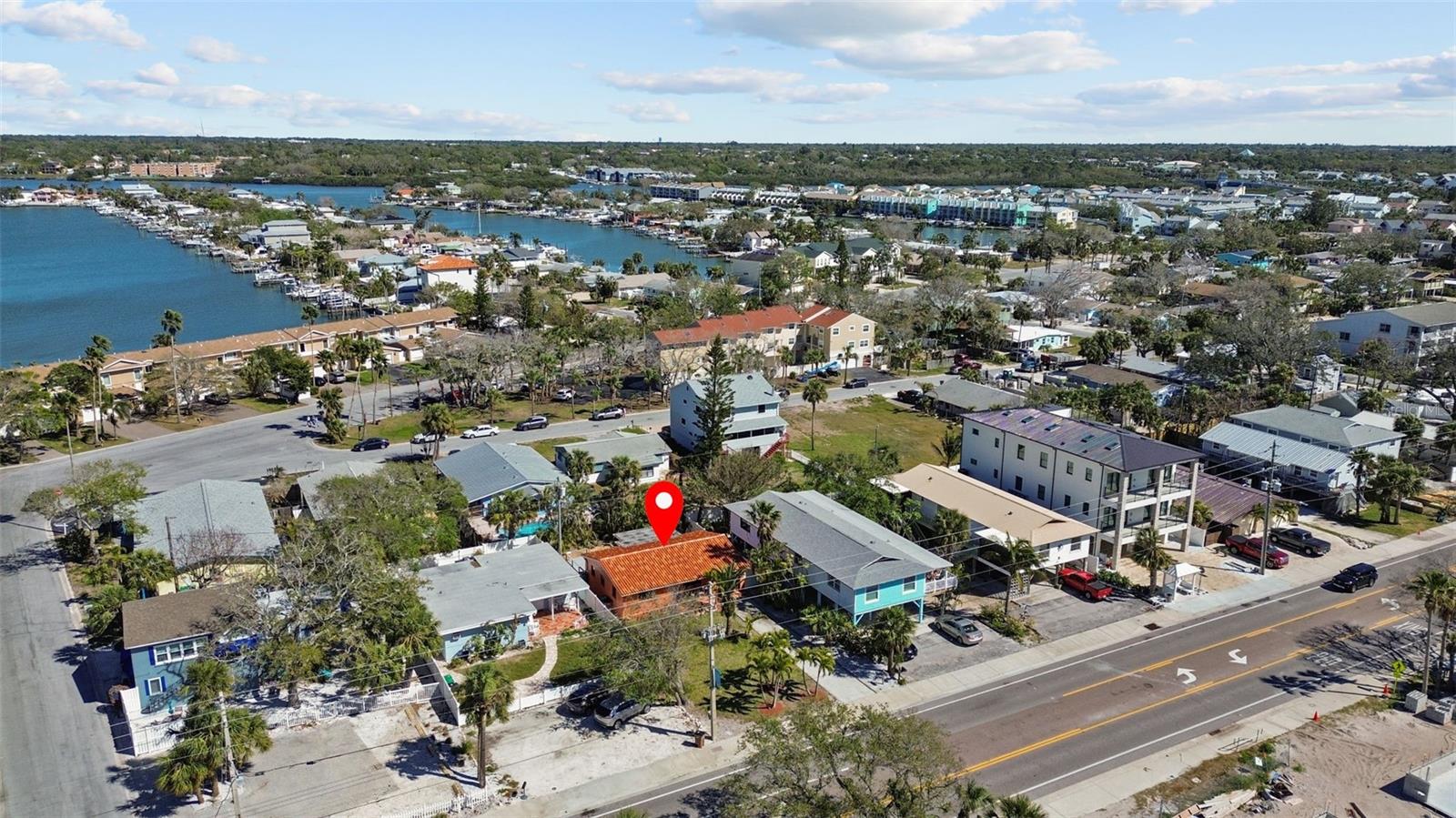 Welcome to 819 Gulf Blvd, a charming 2-bedroom, 1-bath ranch-style quaint Bungalow located just steps from beach access on the stunning shores of Indian Rocks Beach, Indian Rocks Beach Nature Preserve with public dog park and a Boardwalk to through the Mangroves on the Intercoastal.