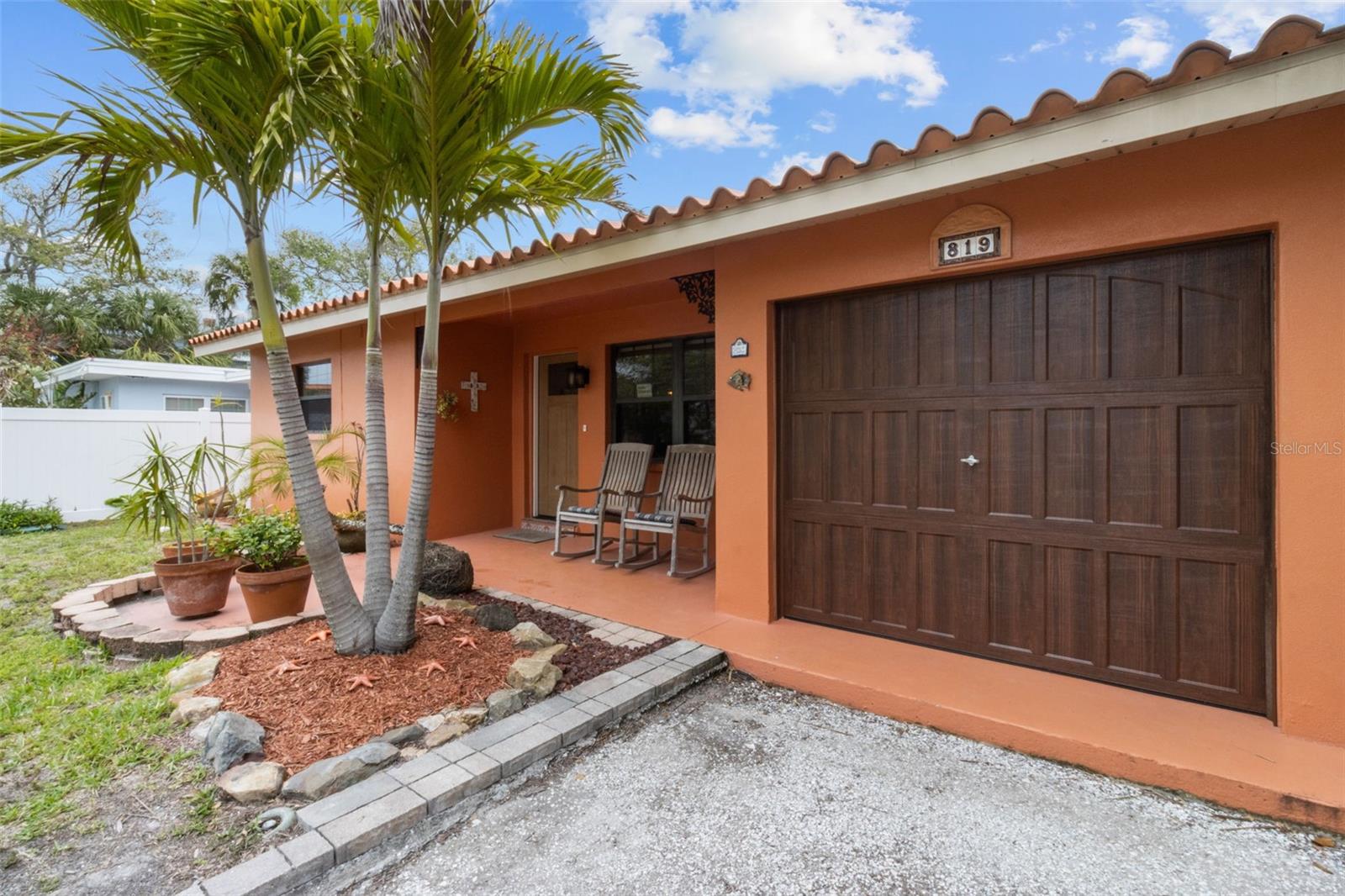 Relax on the West facing front porch and then take a casual walk over to the beach to watch the sun dissappear into the horizon. 819 Gulf Blvd, a charming 2-bedroom, 1-bath ranch-style quaint Bungalow located just steps from beach access on the stunning shores of Indian Rocks Beach, Indian Rocks Beach Nature Preserve with public dog park and a Boardwalk to through the Mangroves on the Intercoastal.