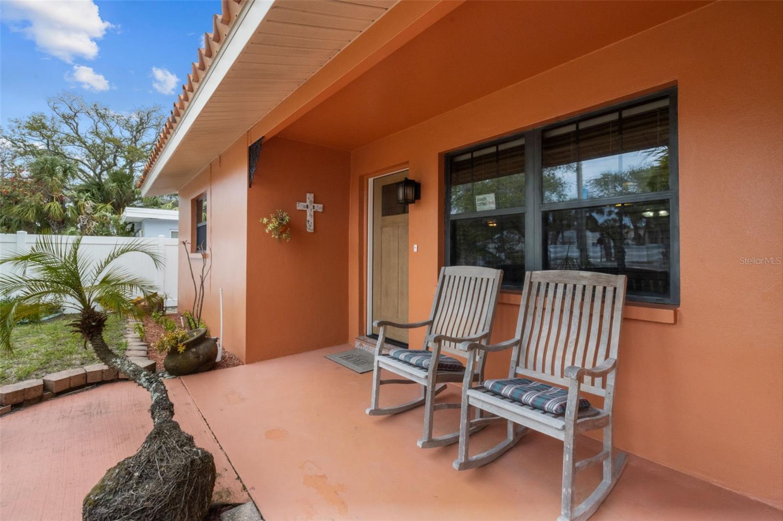 Relax on the West facing front porch and then take a casual walk over to the beach to watch the sun dissappear into the horizon. 819 Gulf Blvd, a charming 2-bedroom, 1-bath ranch-style quaint Bungalow located just steps from beach access on the stunning shores of Indian Rocks Beach, Indian Rocks Beach Nature Preserve with public dog park and a Boardwalk to through the Mangroves on the Intercoastal.