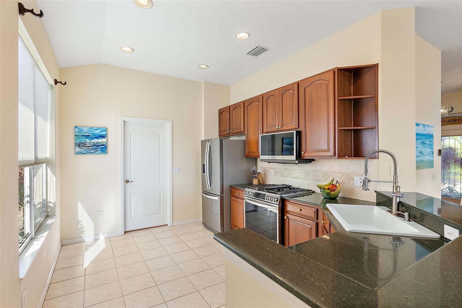 Tiled Kitchen & Hardwood Cabinetry