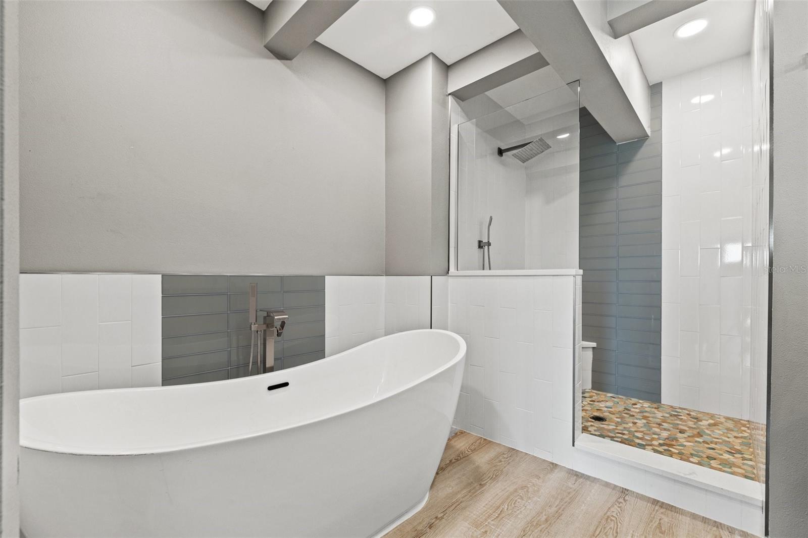 The Gem primary bathroom with soaking tub