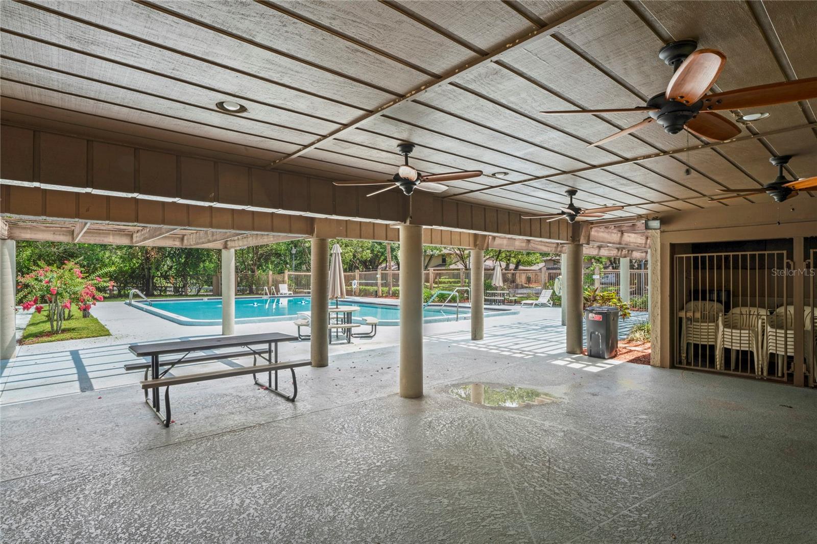 Covered Outdoor BBQ area with ceiling fans