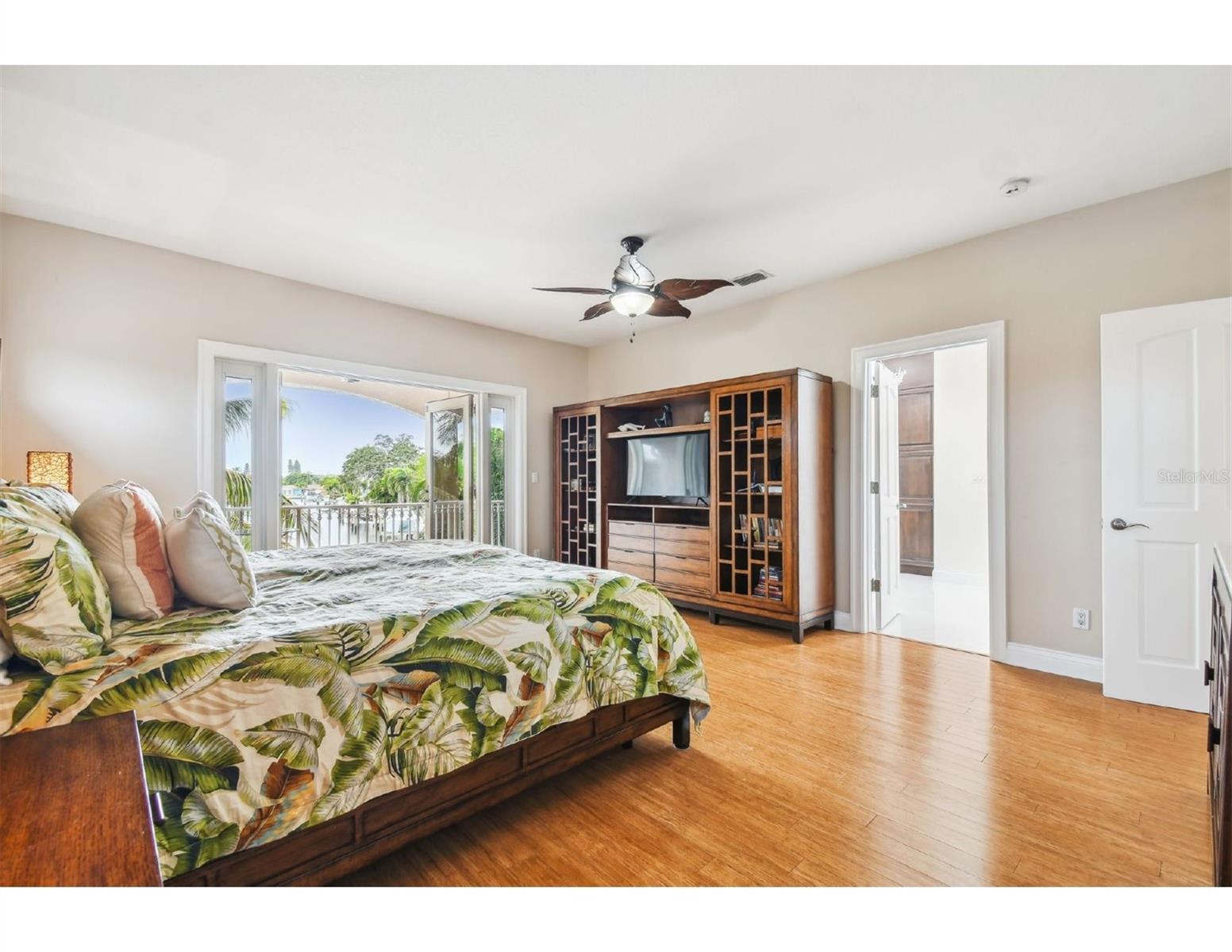 Primary Bedroom with Balcony Water View