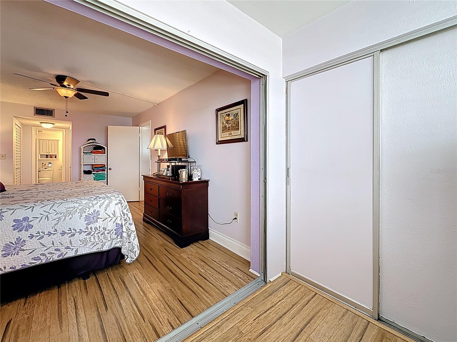 This picture shows the sliders completely closed between the living room and the Florida room
