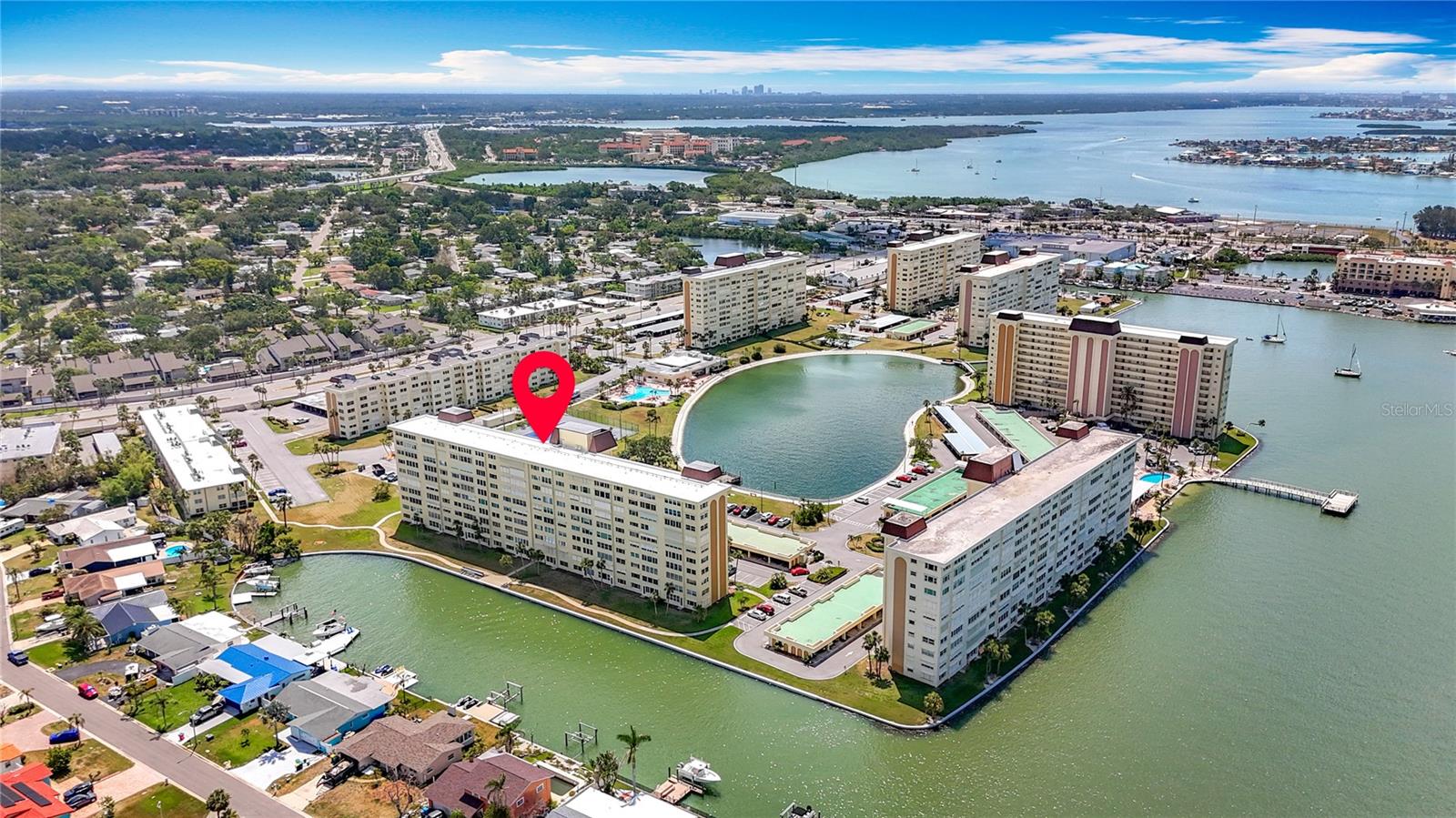 The drop down arrow shows the nice location of this unit.  You have water views from your front door and from the back of your unit.