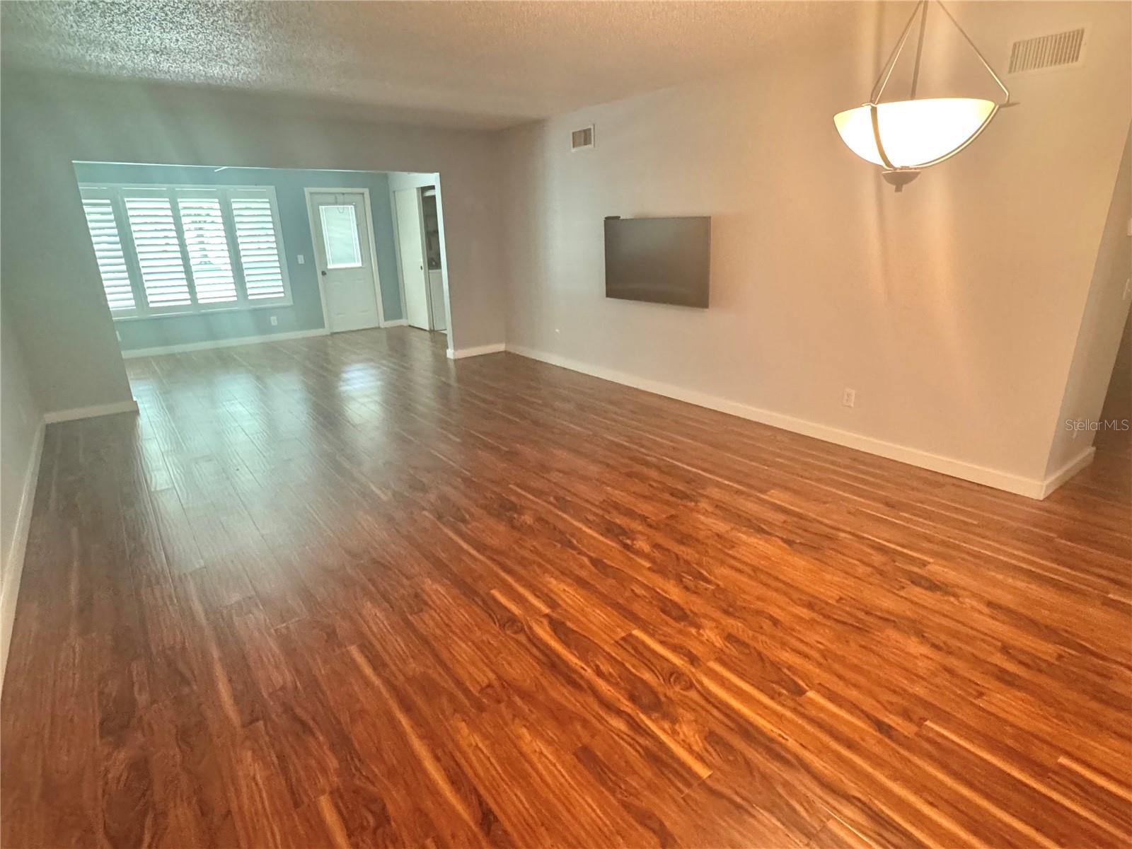Beautiful hand scraped laminate wood floors.