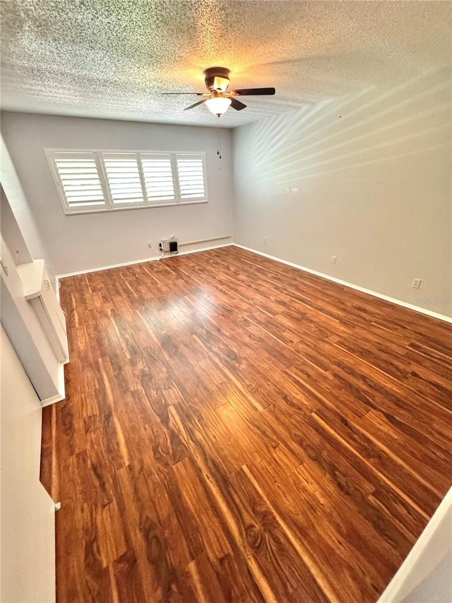 Primary bedroom with plantation shutters