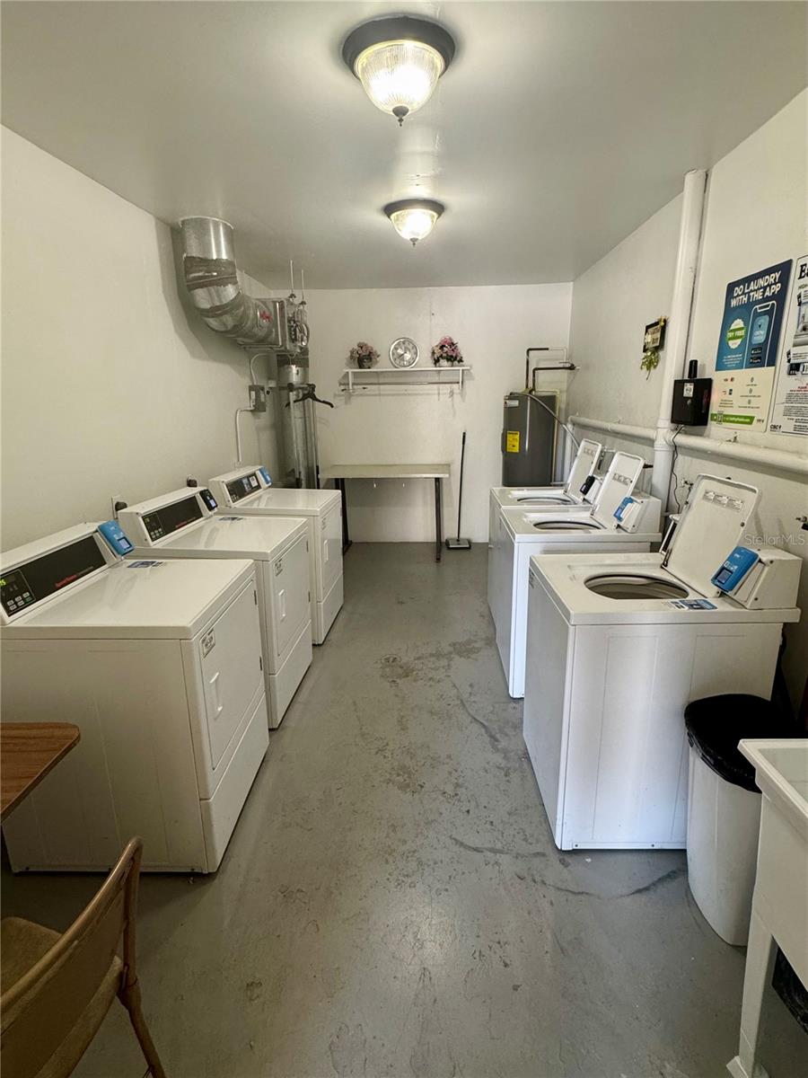 Laundry room next to elevator