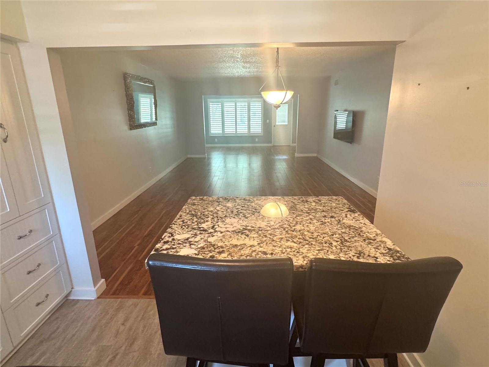 The kitchen has been opened to the living room.